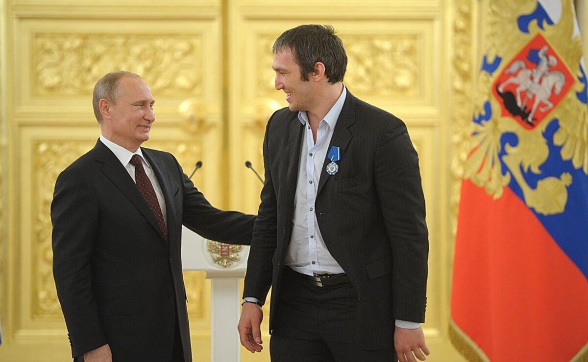 Vladimir Putin s Alexandrem Ovečkinem v roce 2014.