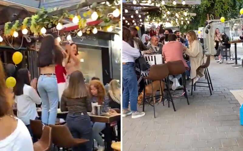 VIDEO: V Izraeli lidé tančí na stolech, nemají lockdown a radikálně uvolňují opatření. Takto vypadá konec pandemie.