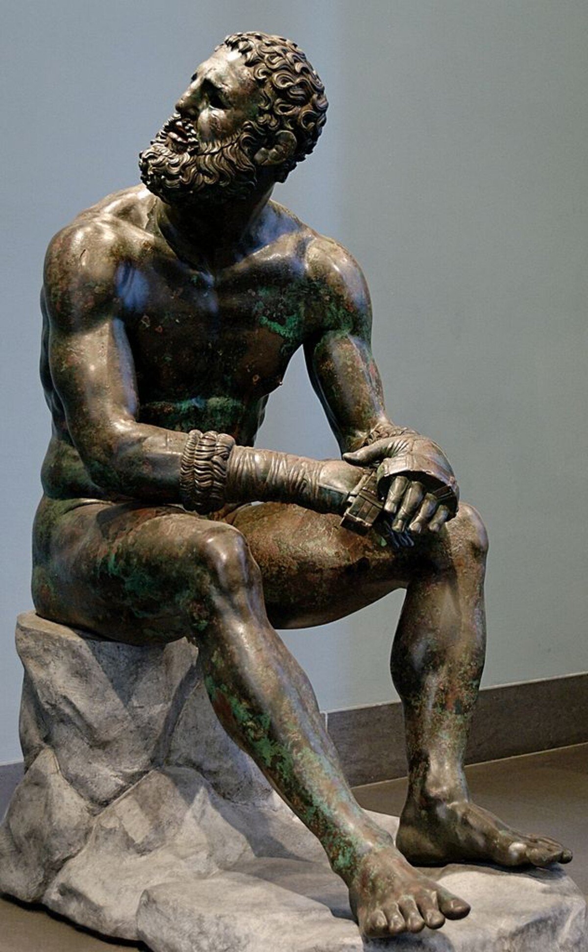 Starověká bronzová socha boxera, 300 až 200 let př. n. l.