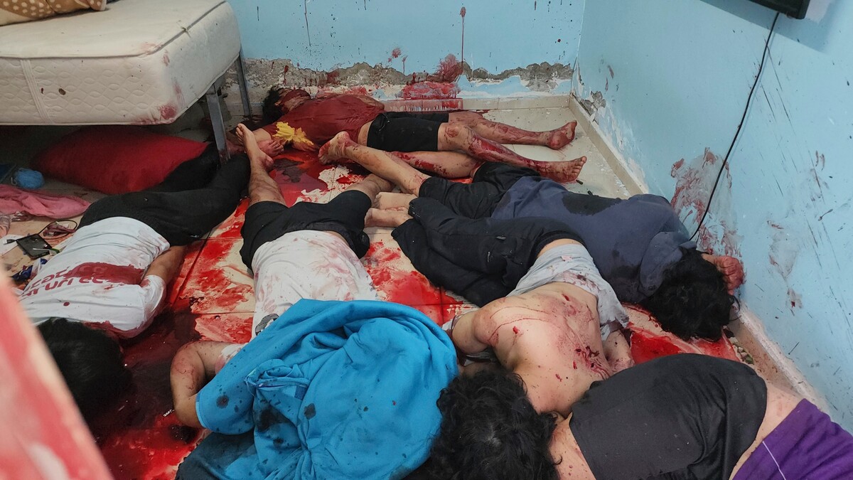 Těla obětí útoku palestinských radikálů.