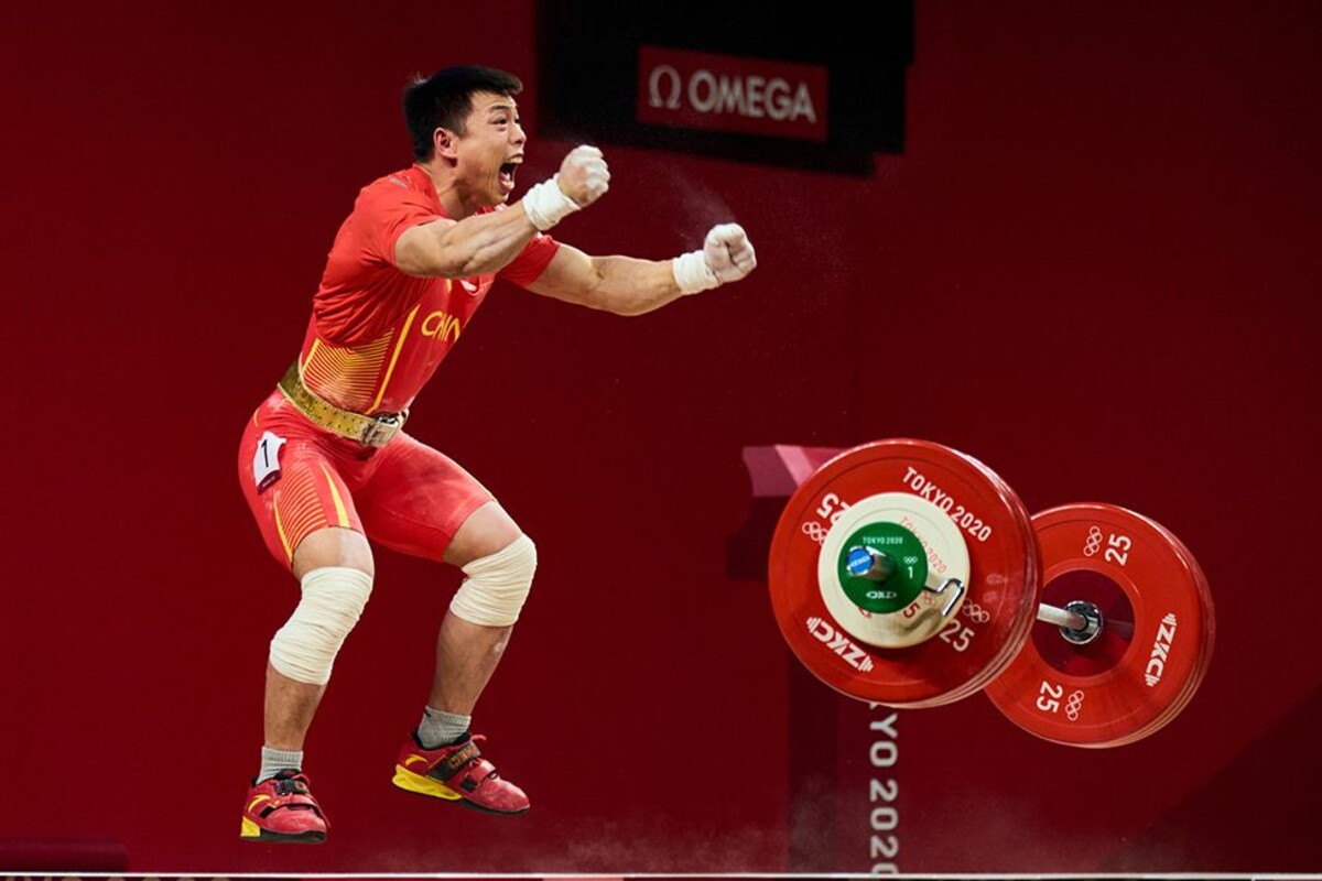 Kategorie: Jiné.
Čínský vzpěrač Chen Lijun zajišťuje zlatou medaili v kategorii mužů do 67 kg na olympijských hrách v Tokiu.