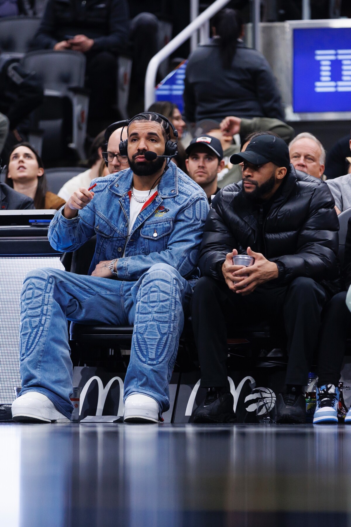 Champagne Papi na zápase NBA medzi tímami Toronto Raptors a Boston Celtics v novembri 2023.