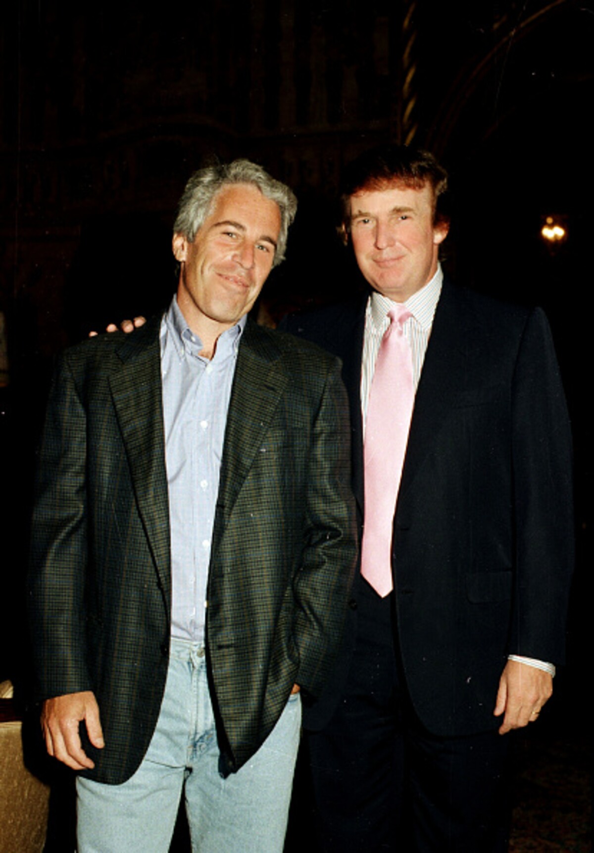 Jeffrey Epstein vľavo a Donald Trump vpravo na Floride v roku 1997.