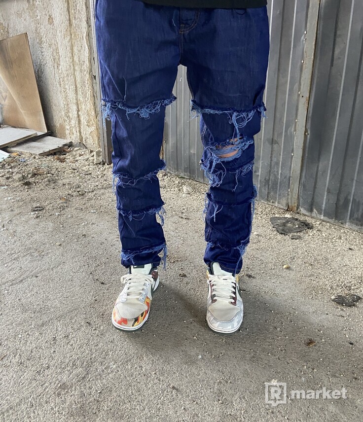 Custom ripped blue jeans