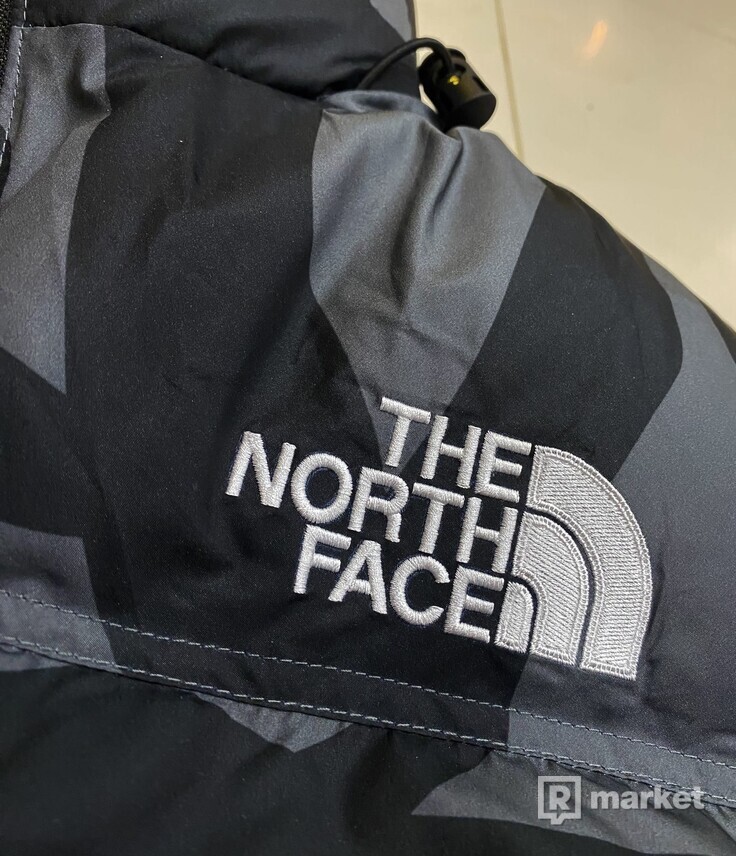 The North Face  x  KAWS - puffer jacket