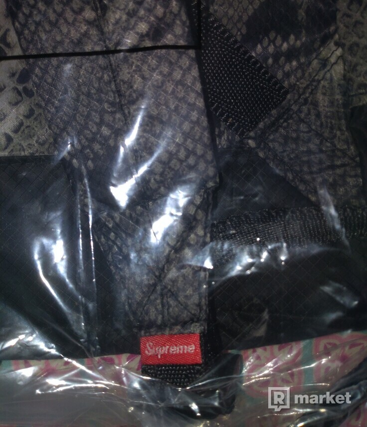 Supreme the NorthFace snakeskin backpack black ss18 Retail price