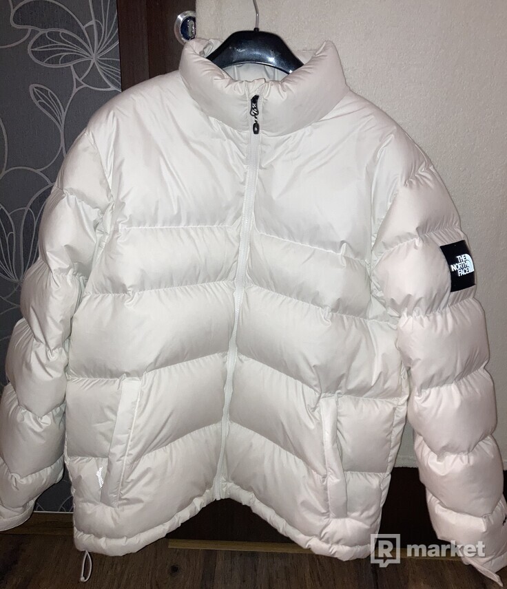 The North Face white nuptse jacket