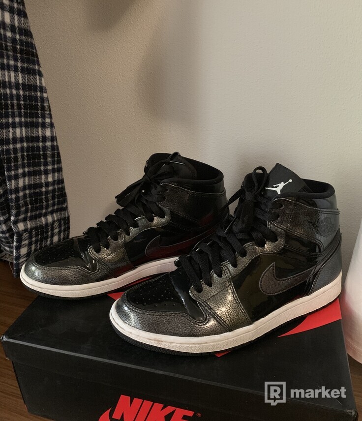 The Air Jordan 1 High Releases In Black Patent Leather